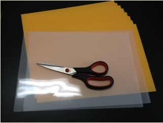 coloured paper laminating pouches scissors